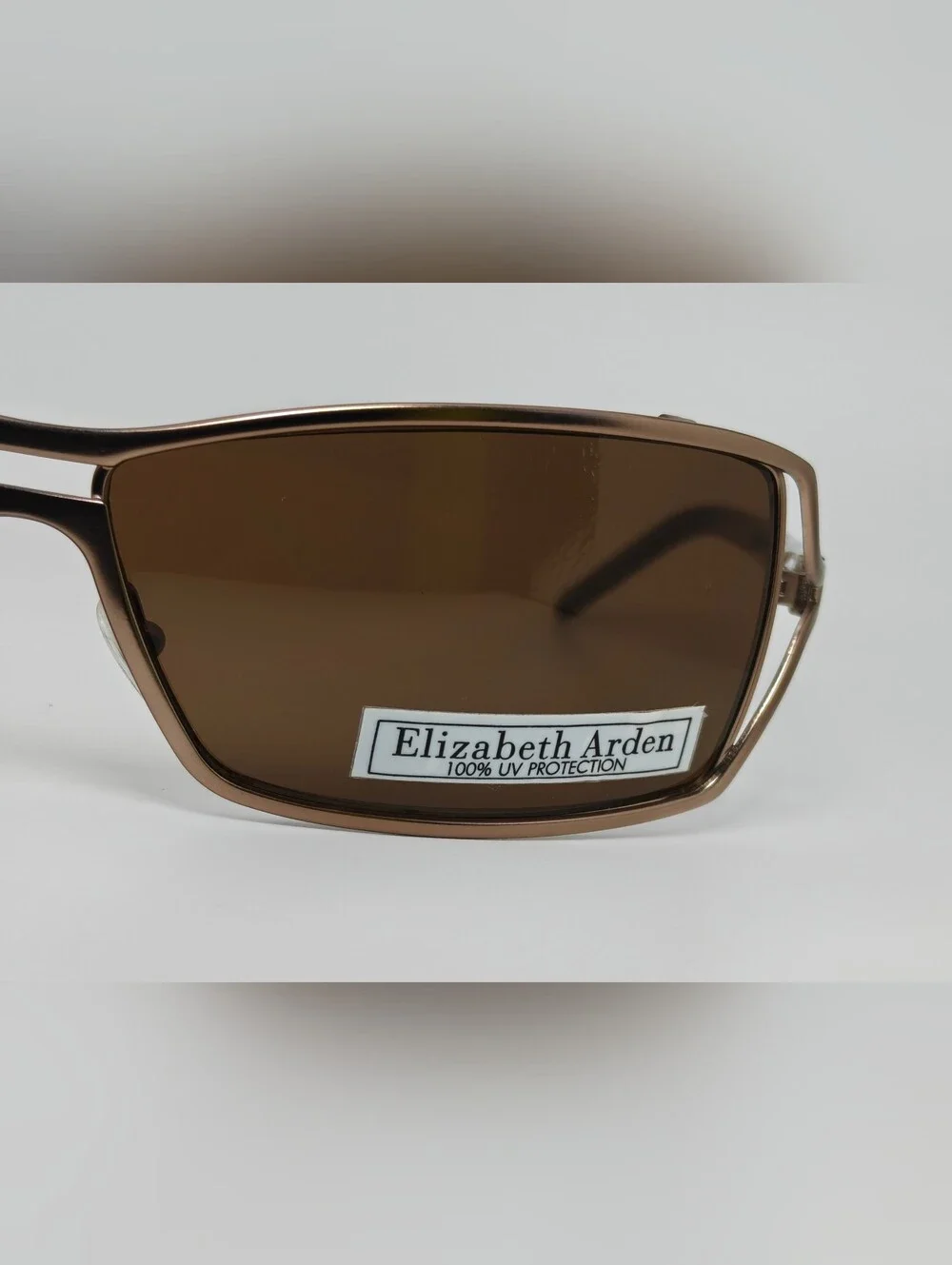 Elizabeth Arden EA5037.  Brown Rectangular Sunglasses with Tinted Brown Lenses.